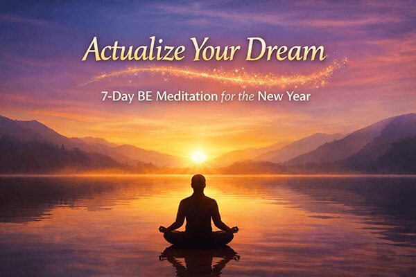 A person meditates in lotus position on a tranquil lake at sunrise, mountains rising behind. Text: “Actualize Your Dream. 7-Day BE Meditation for the New Year.”.